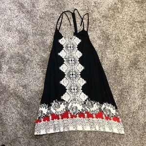 Flowy black dress with pattern and strappy back!